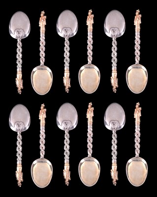 Lot 59 - A SET OF TWELVE CHINESE PARCEL-GILT SILVER TEASPOONS