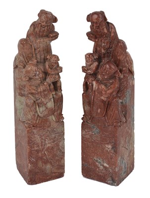 Lot 66 - A PAIR OF CHINESE 'CHICKEN BLOOD' SOAPSTONE SEALS