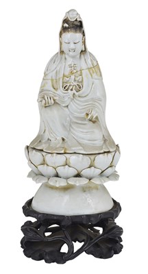 Lot 76 - A CHINESE BLANC DE CHINE FIGURE OF GUANYIN