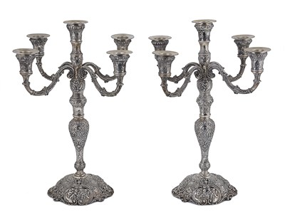 Lot 101 - A PAIR OF GERMAN SILVER CANDELABRA