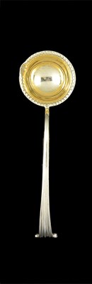 Lot 121 - A GEORGE III SILVER-GILT CREAM LADLE