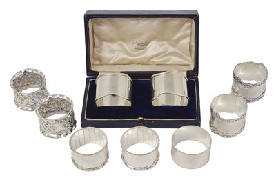 Lot 196 - FOUR PAIRS OF ENGLISH SILVER NAPKIN RINGS