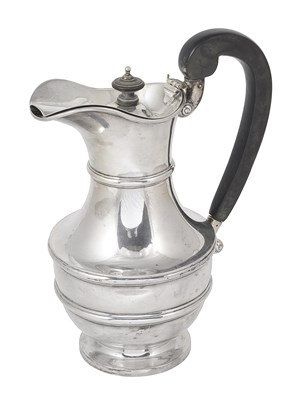 Lot 203 - AN IRISH SILVER HOT WATER JUG