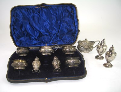 Lot 211 - AN EDWARDIAN SILVER SEVEN-PIECE CONDIMENT SET