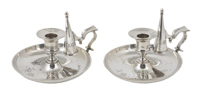 Lot 214 - A PAIR OF EDWARDIAN SILVER CHAMBERSTICKS