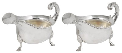 Lot 215 - A PAIR OF EDWARDIAN SILVER LARGE SAUCEBOATS