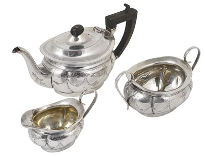 Lot 219 - A GEORGE V SILVER THREE-PIECE TEA SET