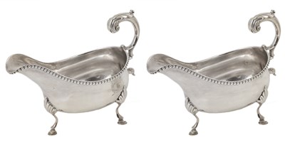 Lot 275 - A PAIR OF GEORGE III SILVER SAUCEBOATS