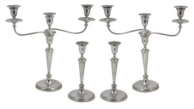 Lot 287 - A SUITE OF GEORGE III SILVER CANDELABRA AND CANDLESTICKS