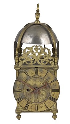 Lot 355 - A BRASS LANTERN CLOCK