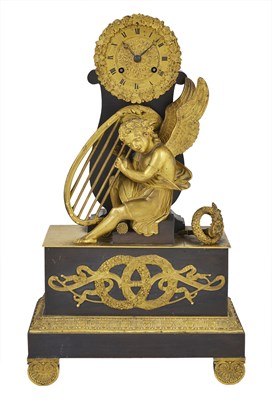 Lot 356 - A FRENCH RESTAURATION GILT AND PATINATED BRONZE MANTEL CLOCK