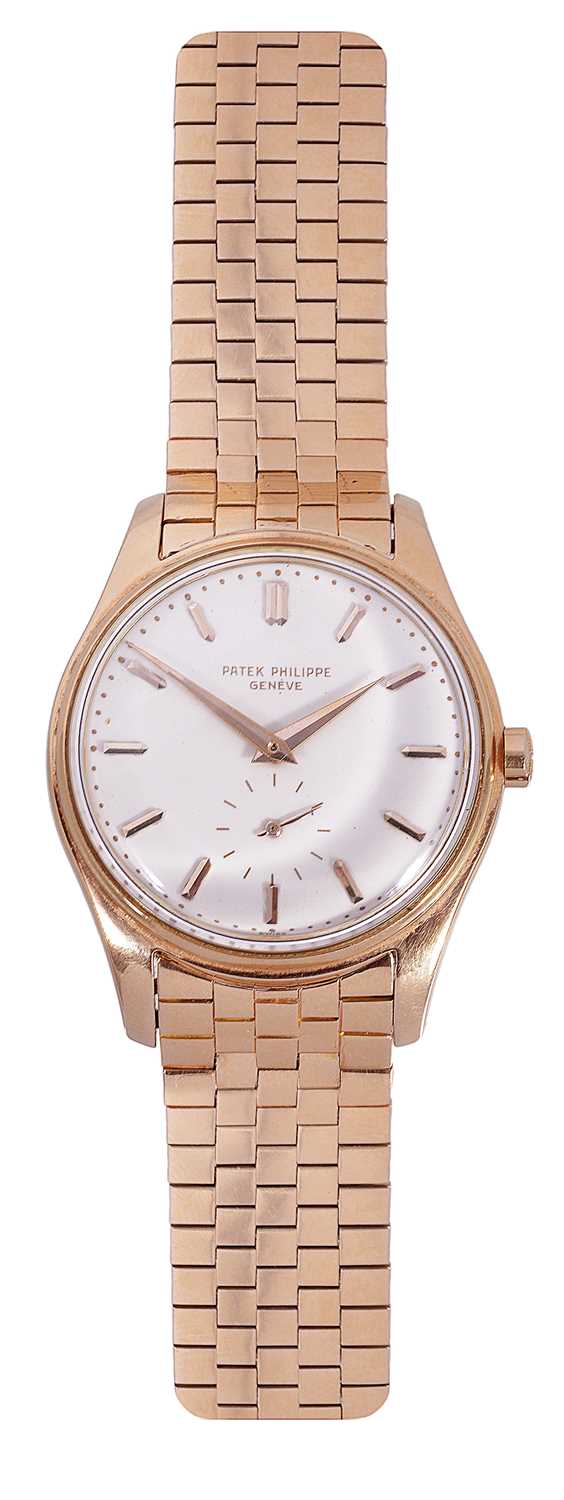 Lot 358 - PATEK PHILIPPE, REF. 2526: A RARE ROSE GOLD GENTLEMAN'S BRACELET WATCH