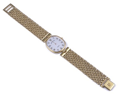 Lot 362 - UNIVERSAL GENEVE: A GENTLEMAN'S GILT-METAL BRACELET WATCH