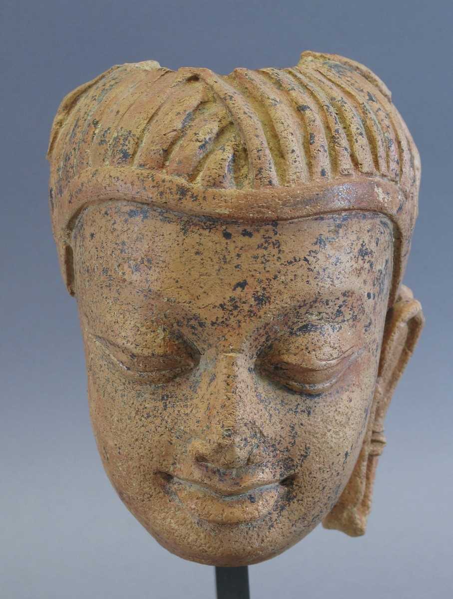 Lot 143 - A GUPTA TERRACOTTA HEAD OF BUDDHA