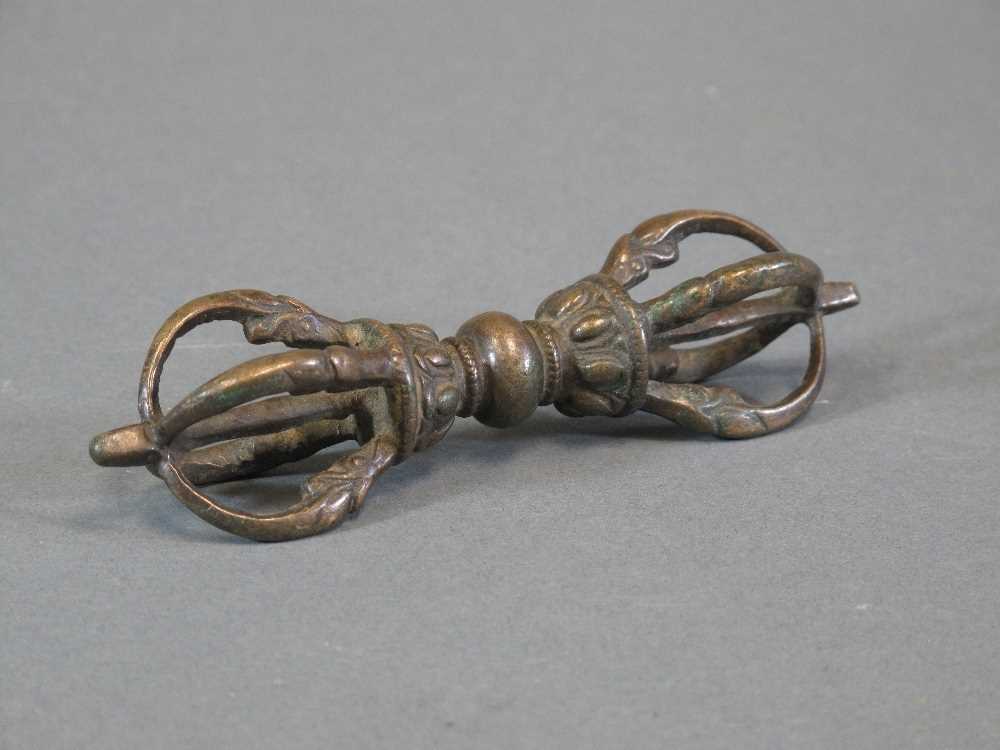 Lot 57 - A BRONZE RITUAL THUNDERBOLT (VAJRA)