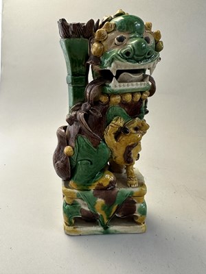 Lot 42 - A PAIR OF CHINESE BISCUIT BUDDHIST LION INCENCE HOLDERS, QING DYNASTY, KANGXI PERIOD (1662-1722)