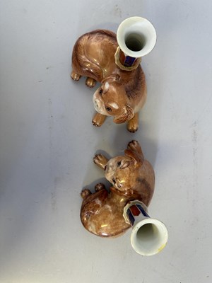 Lot 66 - A PAIR OF CHINESE PUG DOG CANDLE HOLDERS, QING DYNASTY, QIANLONG PERIOD (1736-95)
