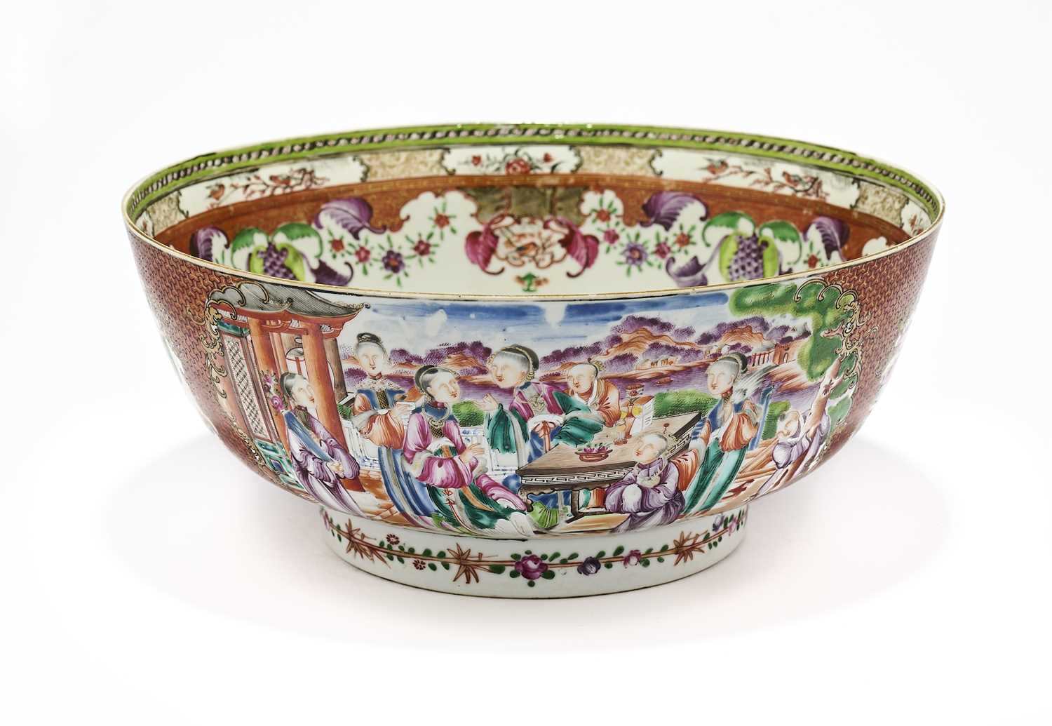 Lot 61 - A CHINESE FAMILLE-ROSE PUNCHBOWL, QING DYNASTY, 18TH CENTURY