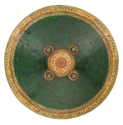 Lot 80 - AN INDIAN LACQUERED HIDE SHIELD (DHAL)