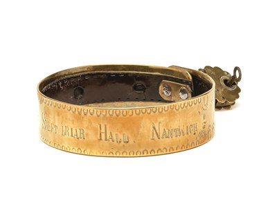 Lot 199 - A BRASS DOG COLLAR, 19TH CENTURY