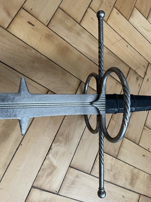 Lot 76 - A TWO-HAND SWORD IN GERMAN EARLY 16TH CENTURY STYLE, 20TH CENTURY