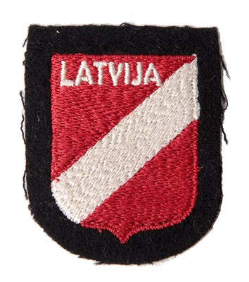Lot 38 - LATVIA: A GERMAN (LATVIAN VOLUNTEER) 'LATVIJA' EMBROIDERED SLEEVE SHIELD INSIGNIA