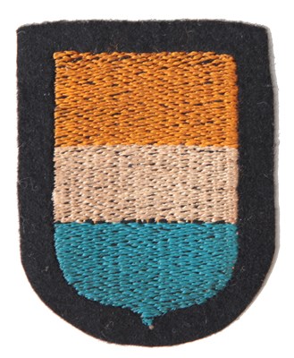 Lot 70 - A 'NEDERLAND' VOLUNTEER (GERMAN SERVICE) MACHINE MADE CLOTH SLEEVE SHIELD INSIGNIA