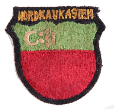 Lot 84 - A RARE NORDKAUKASIEN LEGION VOLUNTEER (GERMAN SERVICE) EMBROIDERED SLEEVE SHIELD INSIGNIA
