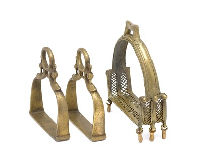 Lot 548 - AN INDIAN COPPER ALLOY STIRRUP AND A PAIR OF INDIAN COPPER ALLOY STIRRUPS, 18TH/19TH CENTURY