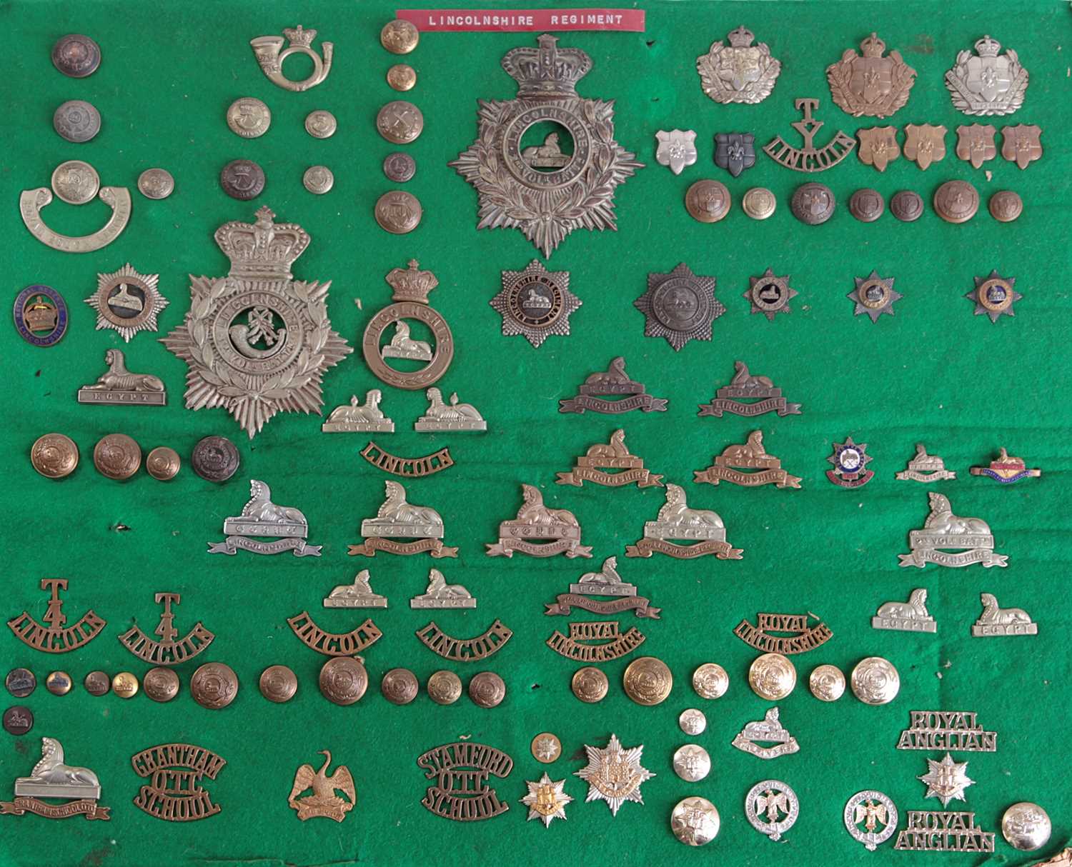 Lot 243 - THE LINCOLNSHIRE REGIMENT - APPROXIMATELY ONE HUNDRED AND FIFTY REGIMENTAL INSIGNIA