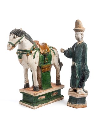 Lot 24 - A CHINESE SANCAI GLAZED POTTERY HORSE AND A GROOM