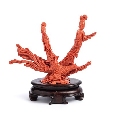 Lot 32 - ËœA CHINESE CORAL GROUP OF TWO MAIDENS ON A PHOENIX