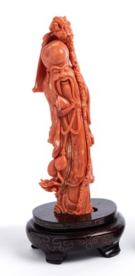 Lot 34 - ËœA CHINESE CORAL FIGURE OF SHOU LAO