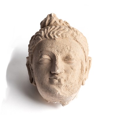 Lot 61 - A GANDHARA STUCCO HEAD OF BUDDHA