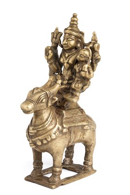 Lot 81 - A BRONZE FIGURE OF SIVA AND PARVATI RIDING ON NANDI BULL