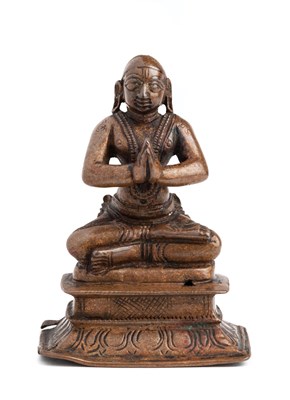 Lot 90 - A BRONZE FIGURE OF A NAYANMAR (SAIVITE SAINT)