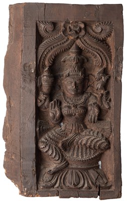 Lot 133 - A SMALL WOOD RELIEF PANEL