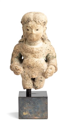 Lot 215 - A MAJAPAHIT PUMICE FIGURE OF A BOY