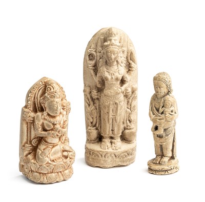 Lot 220 - THREE SMALL PUMICE FIGURES OF DEITIES