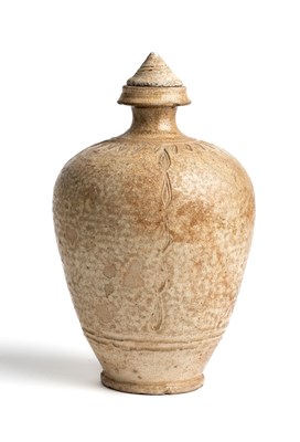 Lot 283 - â“Œ A KHMER GLAZED STONEWARE BOTTLE