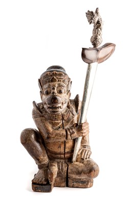 Lot 301 - A JAVANESE KRIS IN CARVED WOOD STAND