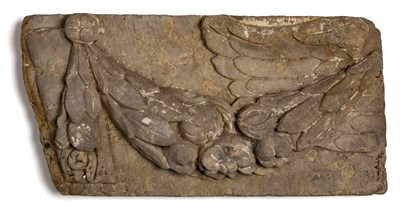 Lot 521 - A LIMESTONE PANEL