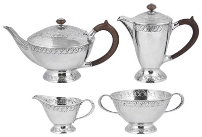 Lot 557 - AN ARTS AND CRAFTS SILVER FOUR-PIECE TEA SET