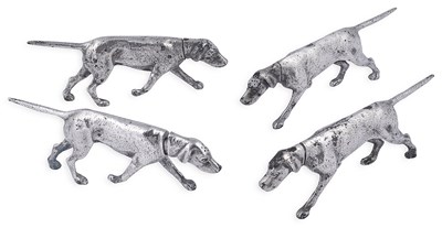 Lot 592 - A SET OF FOUR SILVER DOG FIGURAL PEPPERETTES