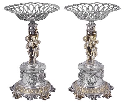 Lot 614 - A PAIR OF VICTORIAN PARCEL-GILT SILVER DESSERT STANDS