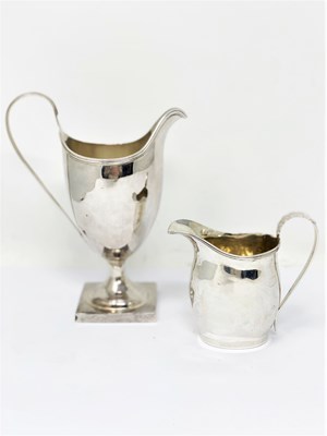 Lot 624 - â’¼ A GEORGE III SILVER MILK JUG