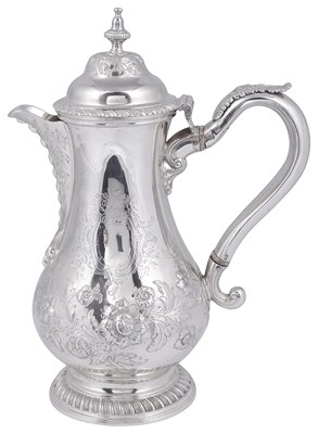 Lot 630 - ËœA GEORGE III SILVER HOT WATER JUG