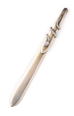 Lot 640 - A DIAMOND SET SILVER-GILT LETTER OPENER