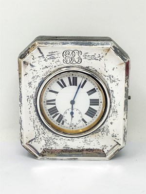 Lot 654 - A NICKEL GOLIATH SWISS WATCH IN SILVER-MOUNTED LEATHER CASE