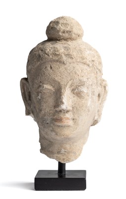 Lot 82 - A SMALL GANDHARA STUCCO HEAD OF BUDDHA